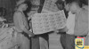 Foto Kesibukan pegawai sedang memperhatikan hasil cetakan uang di Perusahaan Percetakan Uang Negara. 22 Juli 1947 Sumber : ANRI, RVD Batavia 1947-1949 No. 172