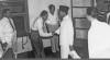 Presiden Sukarno berjabat tangan dengan Kepala Perusahaan Pilem Negara (PPN) R.M. Soetarto saat kunjungan ke PPN. 30 Desember 1950.