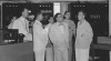 Anggota misi persahabatan Birma dan Menteri Penerangan RI Arnold Mononutu tengah berbincang dalam kunjungannya di stasiun radio Kebayoran Jakarta pada 20 Juli 1951.