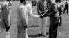 Presiden Sukarno disambut oleh Rektor Universitas Gajah Mada (UGM) Prof. Dr. Sardjito di Lapangan terbang Maguwo Yogyakarta, dalam rangka menerima gelar Doktor Honoris Causa dari UGM dalam bidang Ilmu Hukum. 18 September 1951.