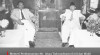 Foto Menteri Perekonomian Mr. Iskaq Tjokroadisurjo (kiri) dan Wakil Perdana Menteri I Wongsonegoro (kanan) duduk bersama di kereta ke presidenan di Stasiun Gambir, 22 November 1953.