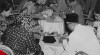 Potret tamu undangan menikmati hidangan dalam acara resepsi perpisahan Direktur Bank Nasional Indonesia (BNI) Gondosuwiryo. 9 Maret 1956